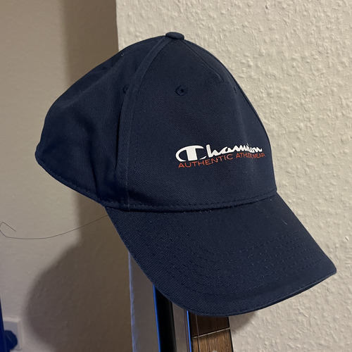 Dark blue hat with Champion logo